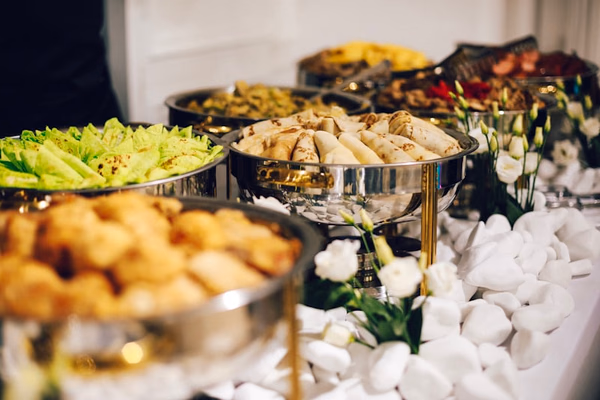 Professional caterer preparing elegant food for an event