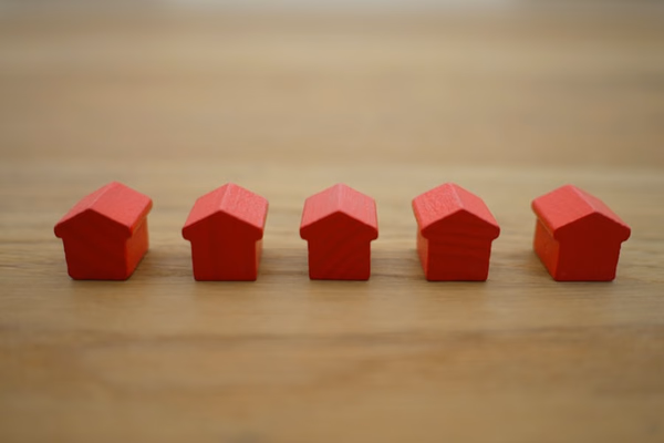 Professional mortgage broker meeting with clients discussing home financing options