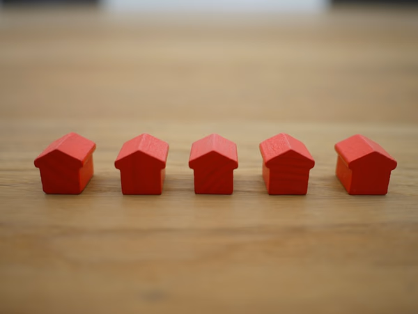 Professional mortgage broker meeting with clients discussing home financing options